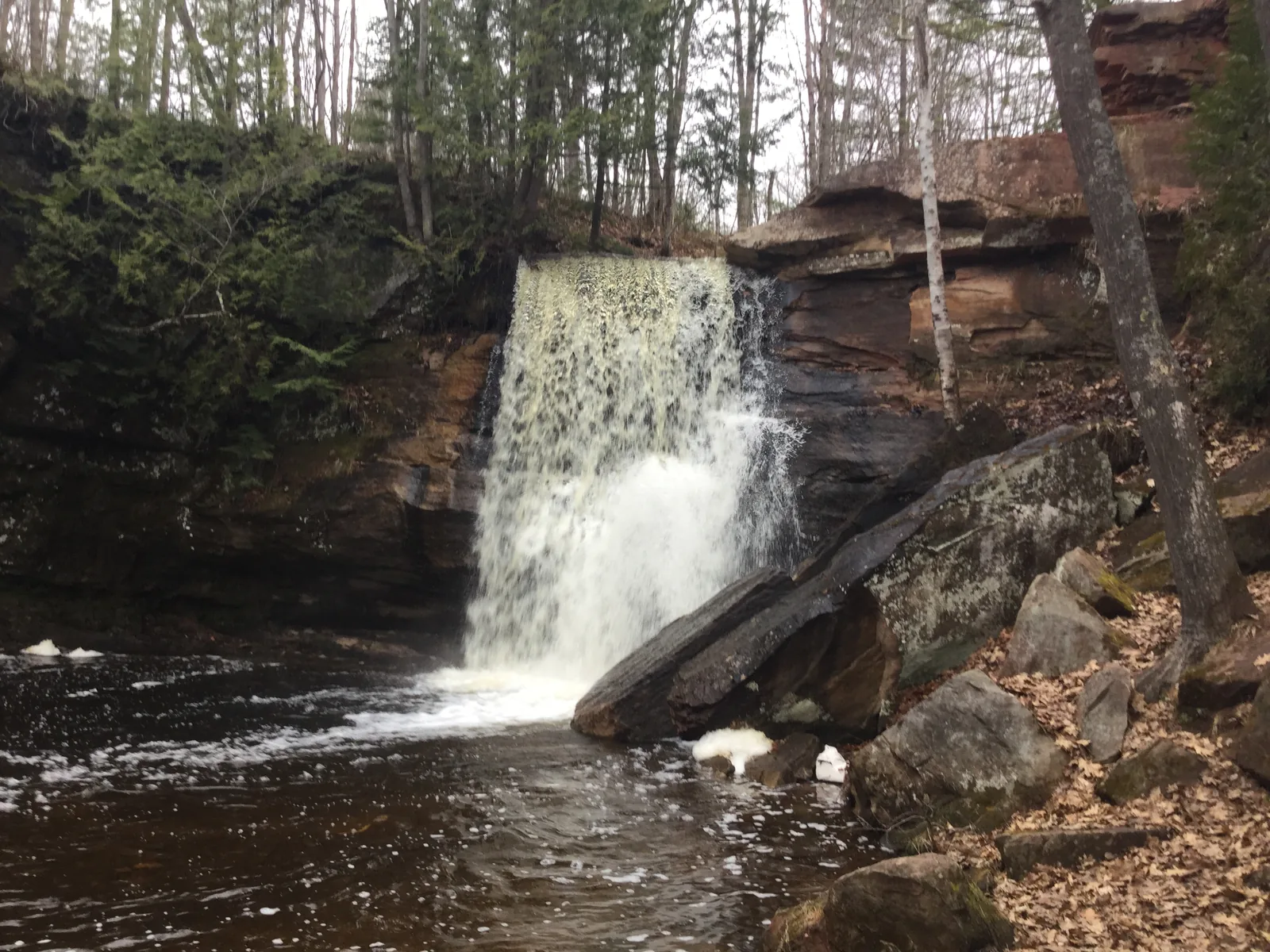 Middle Hungarian Falls — a vertical plunge over reddish Jacobsville sandstone in the Keweenaw.